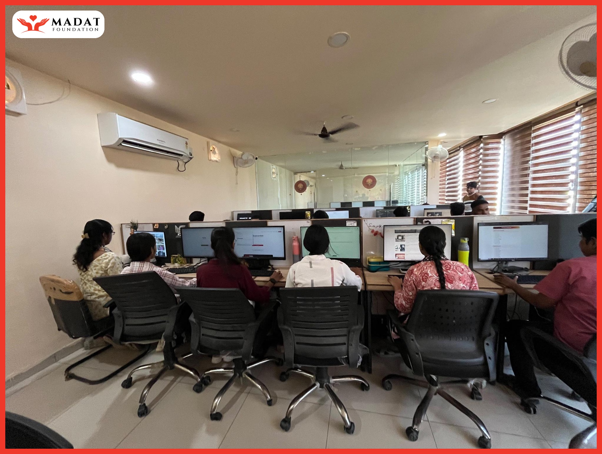 Girls using computers during skills training